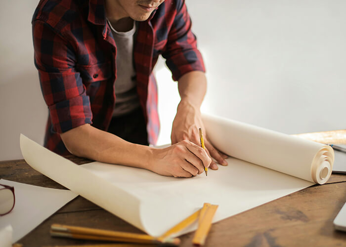 Man getting ready to sketch for build