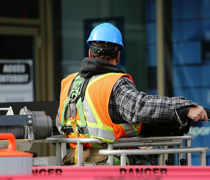 Construction worker on a lift